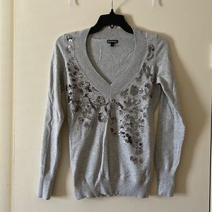 EXPRESS Gray v-neck sweater with silver embellishments.